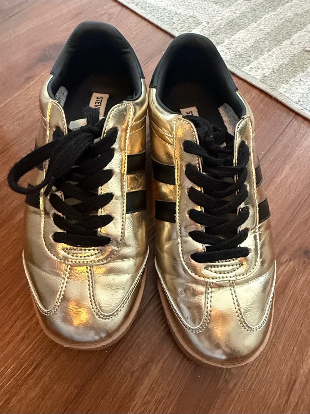 Steve Madden Metallic Gold Sneakers with Black Accents